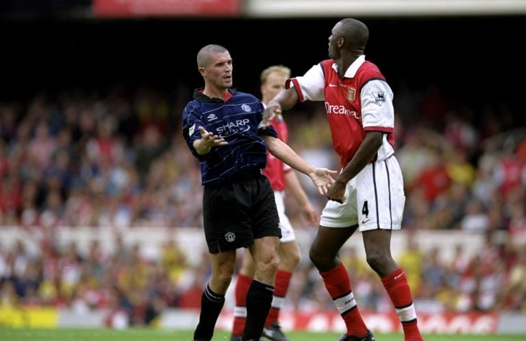 22 Aug 1999:  Roy Keane of Manchester United clashes with Patrick Vieira of Arsenal during the FA Carling Premiership match against Arsenal played ...
