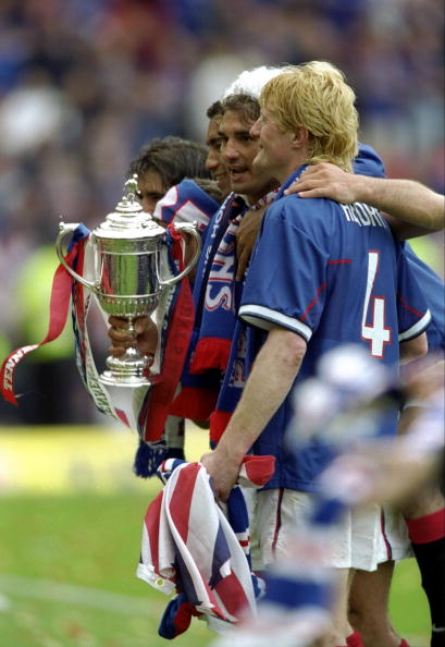 29 May 1999:  Colin Hendry and Lorenzo Amoruso of Glasgow Rangers celebrate victory after the Scottish Cup Final match against arch-rivals Glasgow ...