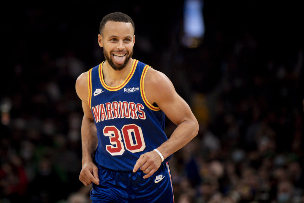 Stephen Curry #30 of the Golden State Warriors reacts after shooting a three pointer during the first half against the Boston Celtics at TD Garden