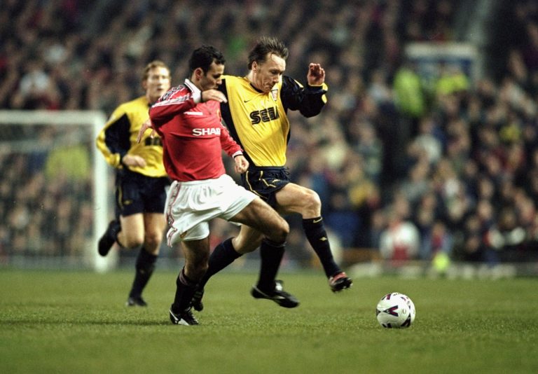 24 Jan 2000:  Ryan Giggs of Manchester United battles with Lee Dixon of Arsenal during the FA Carling Premier League match played at Old Trafford i...