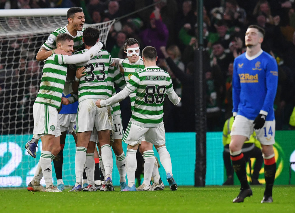 GLASGOW, SCOTLAND - FEBRUARY 02: Reo Hatate of Celtic celebrates with his team-mates after scoring his team's second goal during the Cinch Scottish...