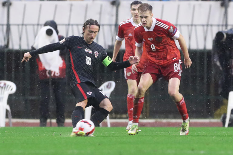 SPLIT, CROATIA - NOVEMBER 14: Luka Modric of Croatia in action with Daniil Fomin of Russia during  the 2022 FIFA World Cup Qualifier match between ...