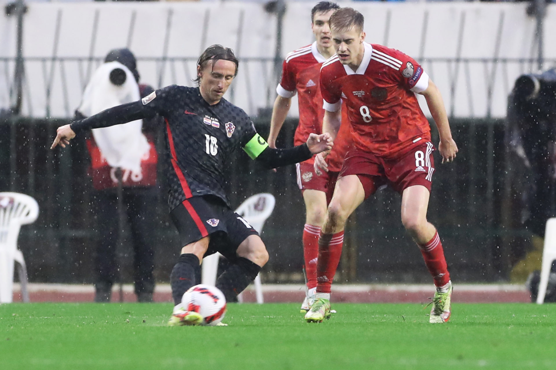 SPLIT, CROATIA - NOVEMBER 14: Luka Modric of Croatia in action with Daniil Fomin of Russia during the 2022 FIFA World Cup Qualifier match between ...