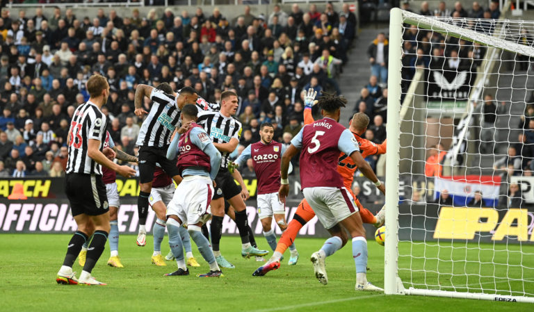 2nd Left slightly obscured heads his second goal past goalkeeper Robin Olsen during the Premier League match between Newcastle United and Aston Villa at St. James Park on October 29, 2022 in Newcastle upon Tyne, England. (Photo by Stu Forster/Getty Images