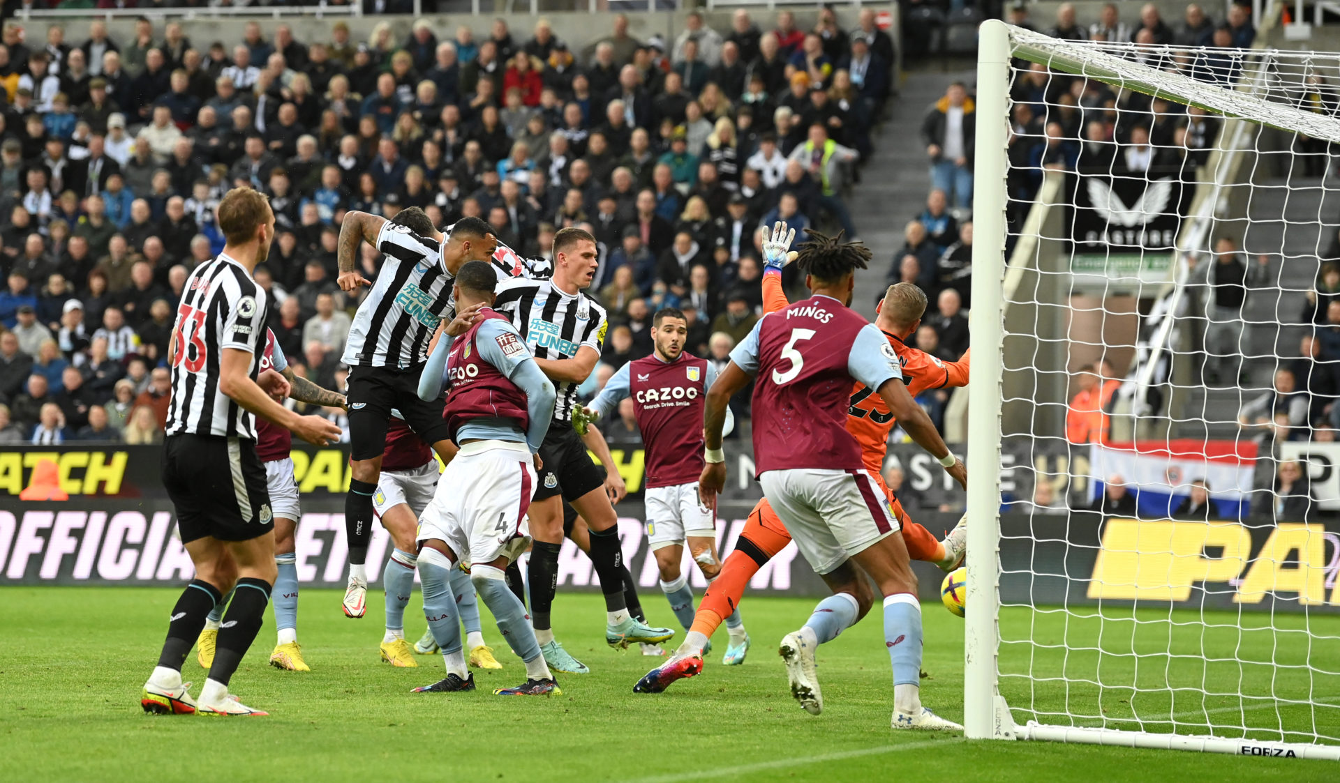 2nd Left slightly obscured heads his second goal past goalkeeper Robin Olsen during the Premier League match between Newcastle United and Aston Villa at St. James Park on October 29, 2022 in Newcastle upon Tyne, England. (Photo by Stu Forster/Getty Images