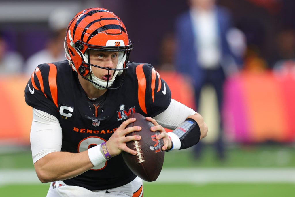Joe Burrow #9 of the Cincinnati Bengals runs with the ball during the first half of Super Bowl LVI against the Los Angeles Rams at SoFi Stadium on February 13, 2022 in Inglewood, California.