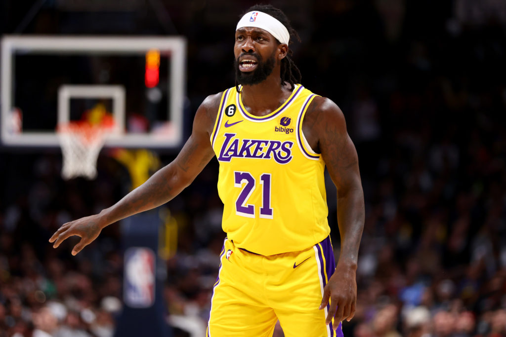Patrick Beverley #21 of the Los Angeles Lakers reacts to a play against the Denver Nuggets at Ball Arena.