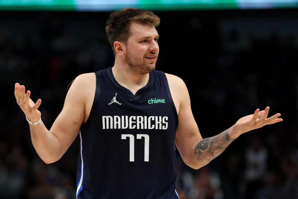 Luka Doncic #77 of the Dallas Mavericks reacts to a play during the second quarter against the Golden State Warriors in Game Three of the 2022 NBA Playoffs Western Conference Finals at American Airlines Center.