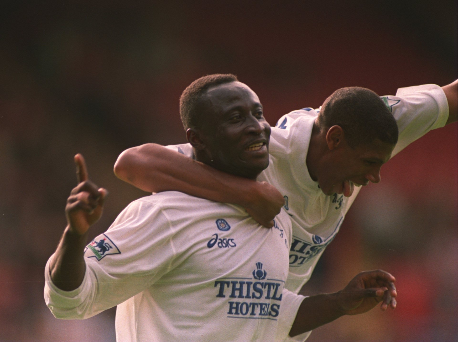 23 SEP 1995: TONY YEBOAH OF LEEDS UNITED CELEBRATES WITH CARLTON PALMER HIS FIRST GOAL OF THE MATCH AND THE SECOND FOR LEEDS UNITED DURING THE PRE...