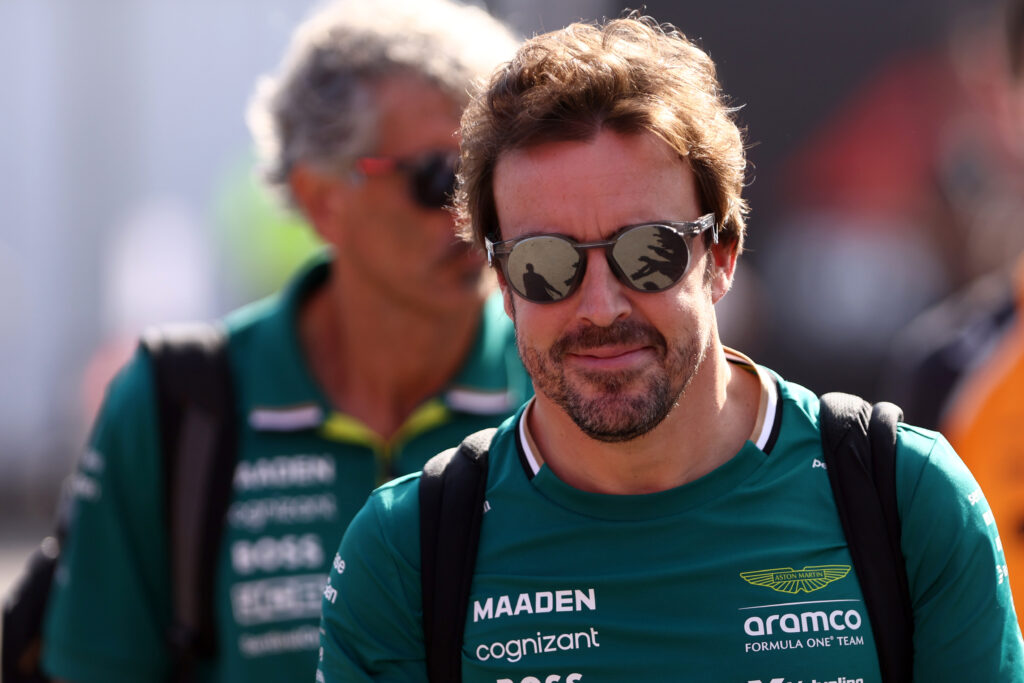 Fernando Alonso of Aston Martin looks on before  the F1