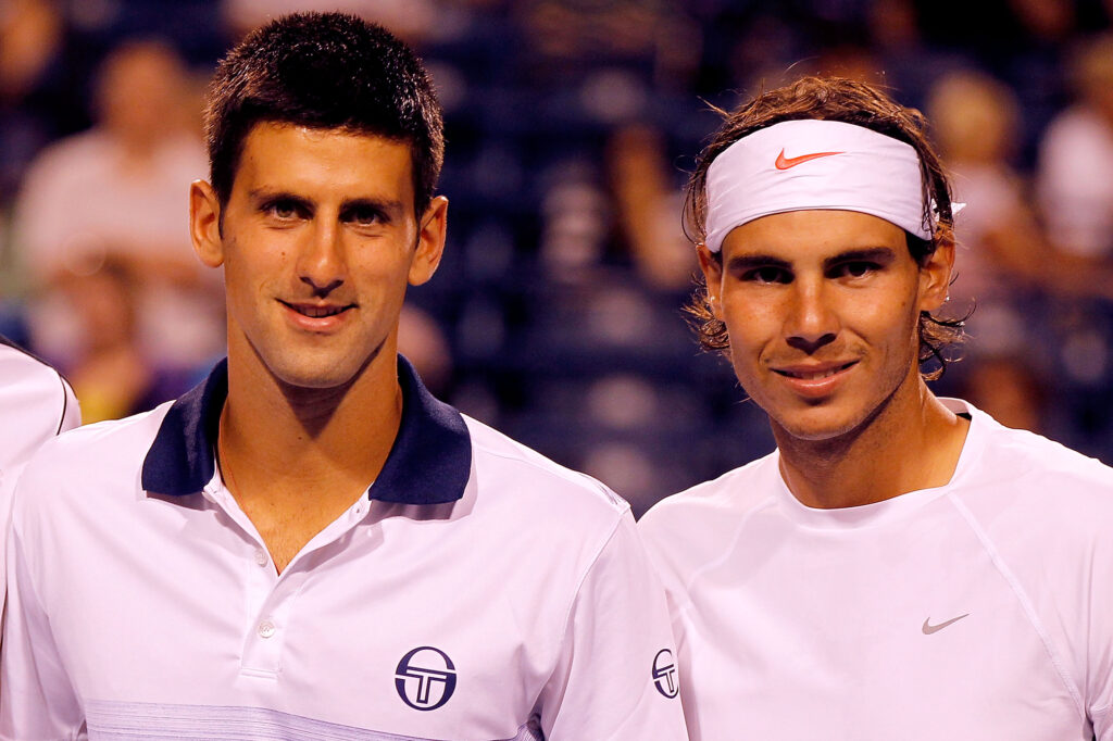 Novak Djokovic of Serbia and Rafael Nadal of Spain pose for photographers before their doubles match against Vasek Pospisil and Milos Raonic of Canada during the Rogers Cup at the Rexall Centre on August 9, 2010 in Toronto, Canada.