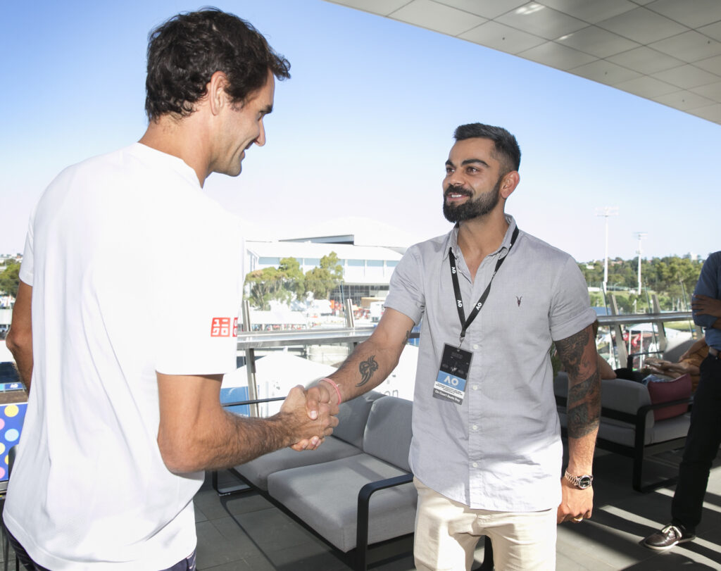 Roger Federer and Virat Kohli shake hands at the 2019 Australian Open