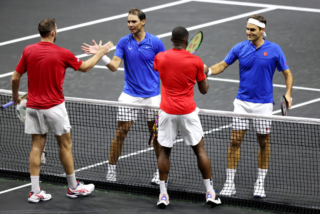 Jack Sock, Frances Tiafoe, Roger Federer, and Rafael Nadal shake hands after their match at the 2022 Laver Cup