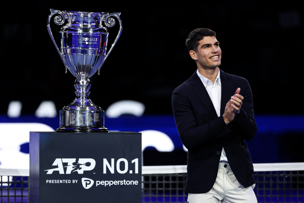 Carlos Alcaraz of Spain receives the ATP World Tour No. 1 trophy during day four of the Nitto ATP Finals at Pala Alpitour on November 16, 2022 in Turin, Italy.