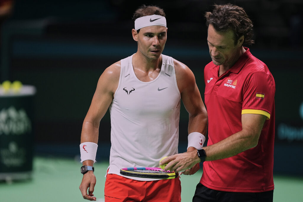 Rafael Nadal (L) of Team Spain and Carlos Moya (R) former player during Spain's training session prior to the Davis Cup match at Palacio de Deportes Jose Maria Martin Carpena on November 18, 2024 in Malaga, Spain.