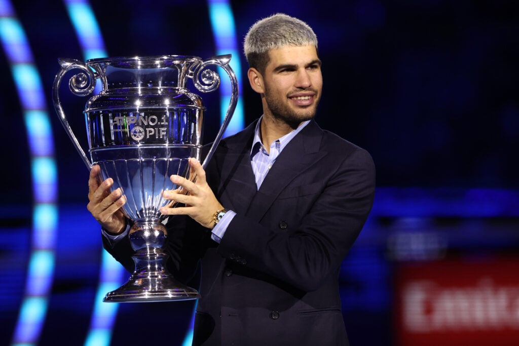 Carlos Alcaraz of Spain is awarded with the ATP World Tour No. 1 trophy on Day six of the Nitto ATP World Tour Finals.