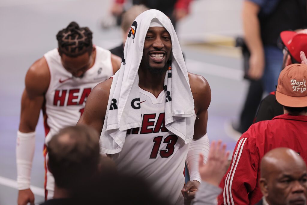Bam Adebayo #13 of the Miami Heat smiles as he exits after a win against the Chicago Bulls.