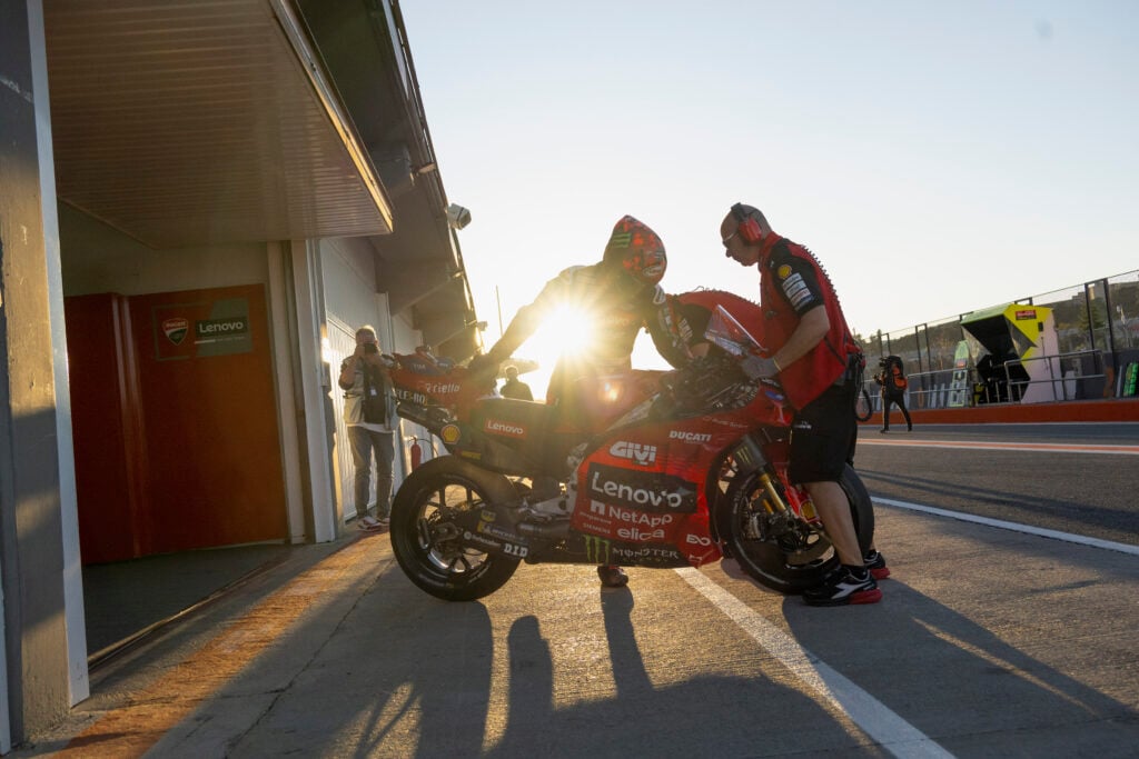 Francesco Bagnaia about to leave the pit lane during post-season testing at Valencia in 2025