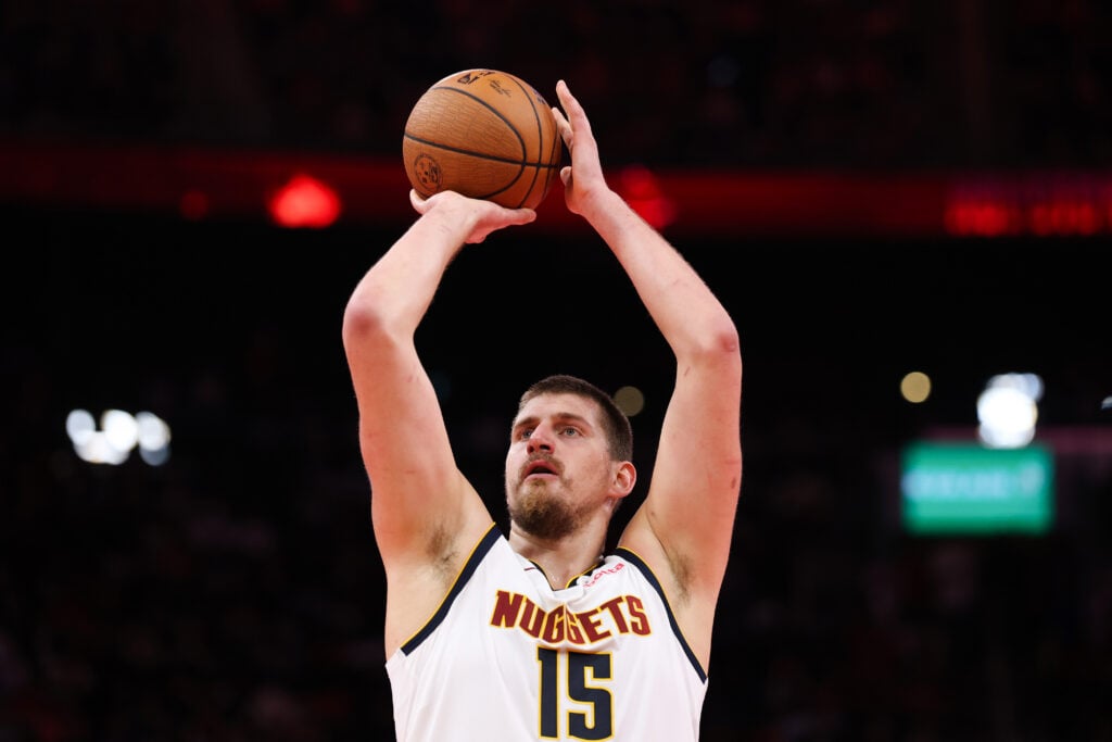 Nikola Jokić #15 of the Denver Nuggets shoots the ball during the first quarter of the game against the Houston Rockets at Toyota Center.