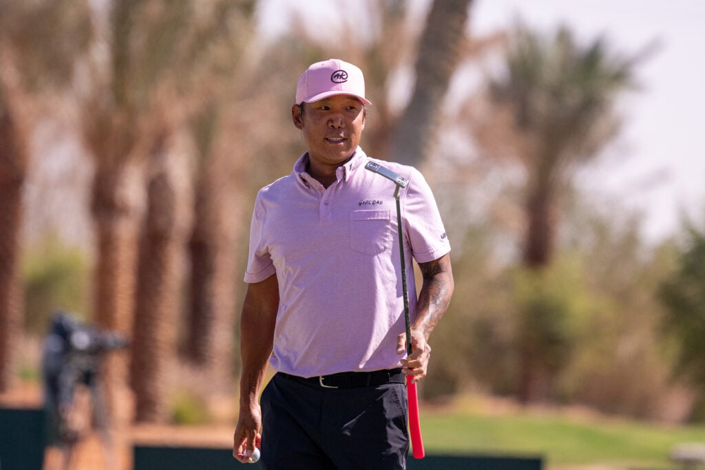 Anthony Kim of the United States reacts after missing his putt on hole 3 during the final round of the PIF Saudi International