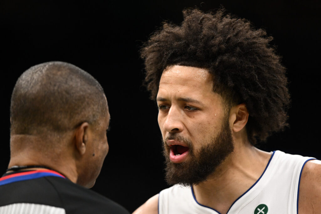 Cade Cunningham #2 of the Detroit Pistons talks with referee Tony Brothers #25 during the first half at the TD Garden.