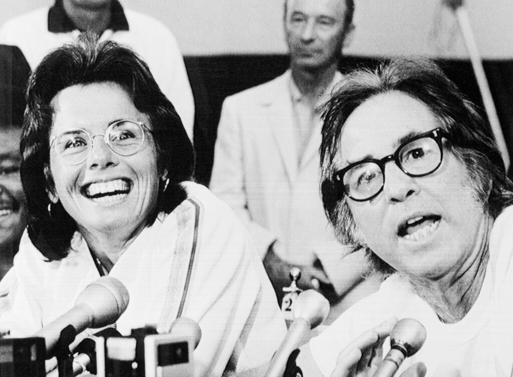 Tennis pro Billie Jean King (L) laughs as Bobby Riggs tells how he intends to beet Ms. King in their 0,000 winner-take-all match in the Astrodome 9/20. The two met for a news conference, 9/19.