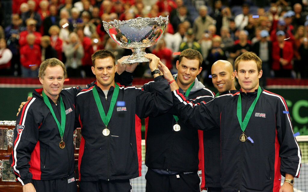 Team USA, (L-R) Captain Patrick McEnroe, Mike Bryan, Bob Bryan, James Blake and Andy Roddick, hoist the Davis Cup trophy after defeating Russia 4-1 during the final day of the Davis Cup Final.
