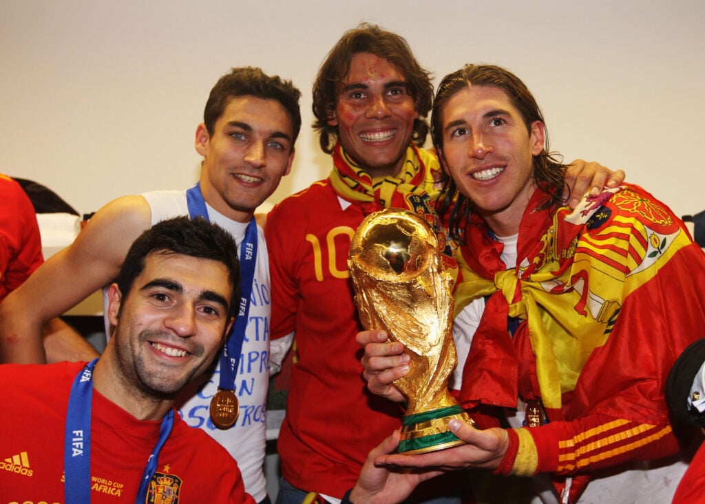 Rafael Nadal poses with Jesus Navas, Raul Albiol and Sergio Ramos after Spain win the 2010 World Cup.