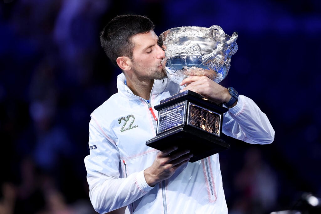 Novak Djokovic celebrates with the Australian Open title in 2023