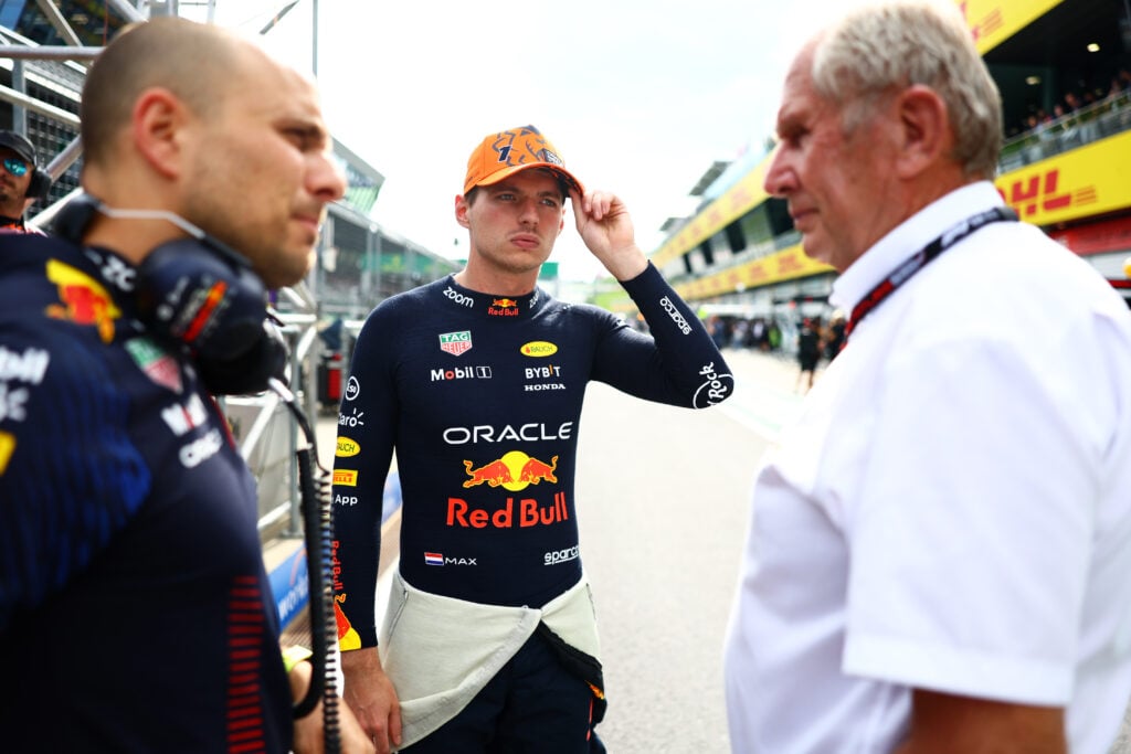 Max Verstappen speaking to Helmut Marko and Gianpiero Lambiase in the pitlane ahead of the 2023 Austrian Grand Prix.