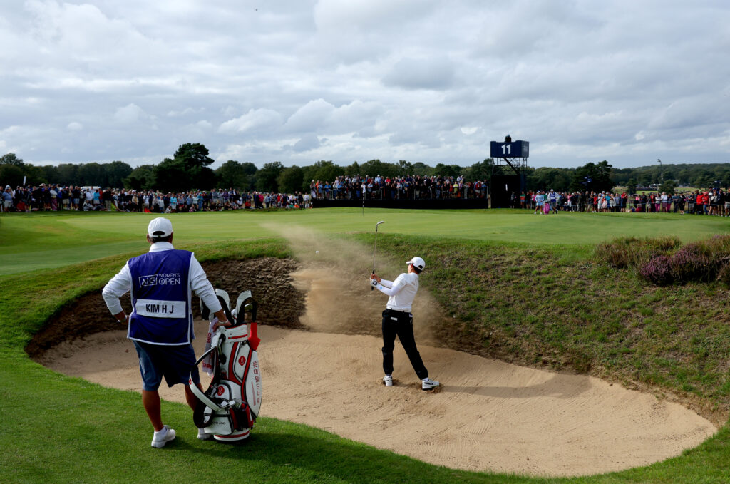 Hyo Joo Kim of South Korea plays her third shot on the 11th hole on Day Three of the AIG Women's Open at Walton Heath Golf Club