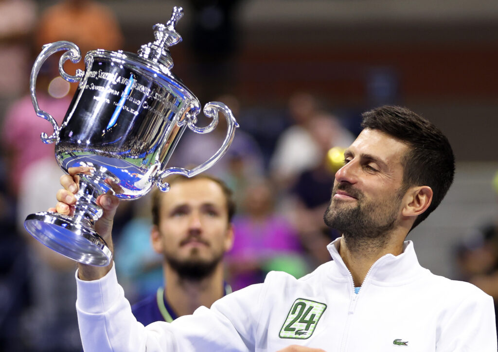 Novak Djokovic of Serbia holds aloft his winners trophy after defeating Daniil Medvedev of Russia during their Men's Singles Final match on Day Fourteen of the 2023 US Open