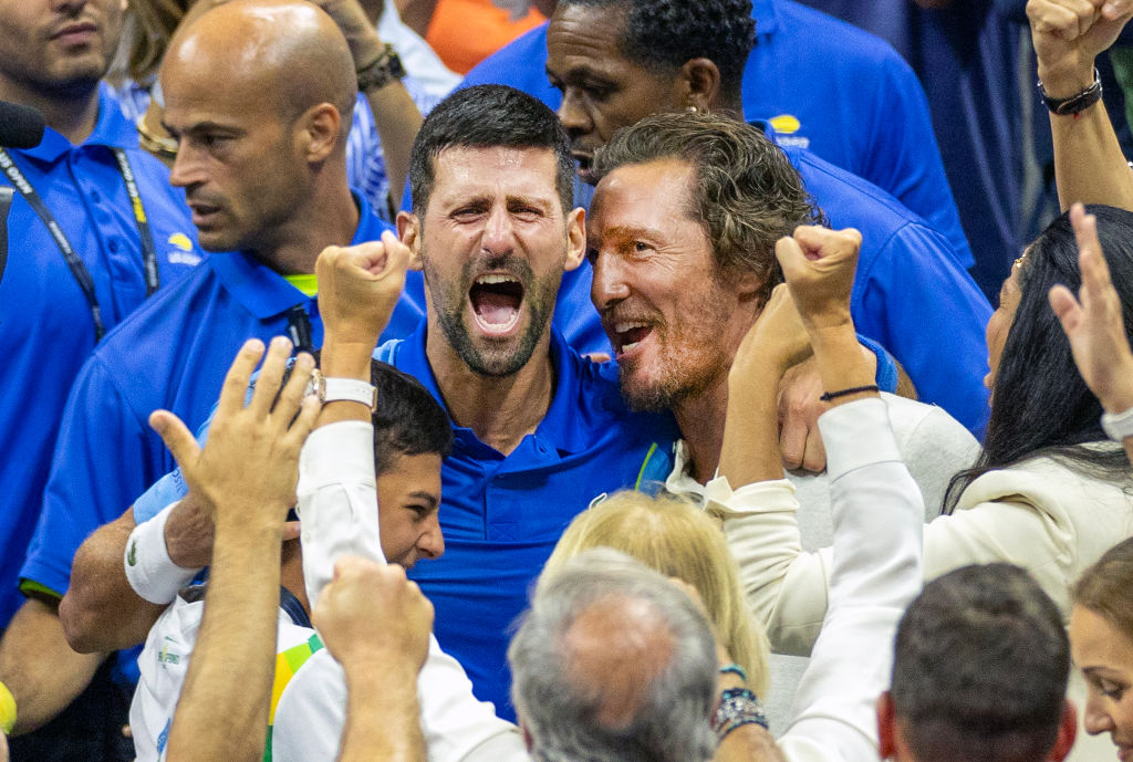 Matthew McConaughey and Novak Djokovic embrace