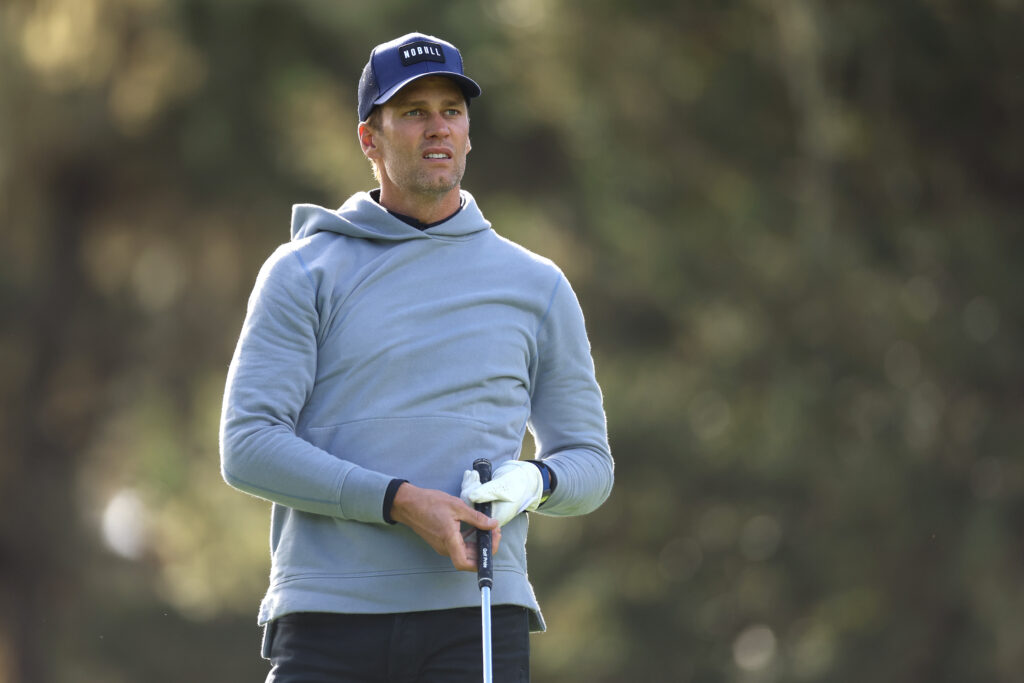 Former NFL quarterback Tom Brady watches his shot during the first round of the AT&T Pebble Beach Pro-Am at Spyglass Hill Golf Course