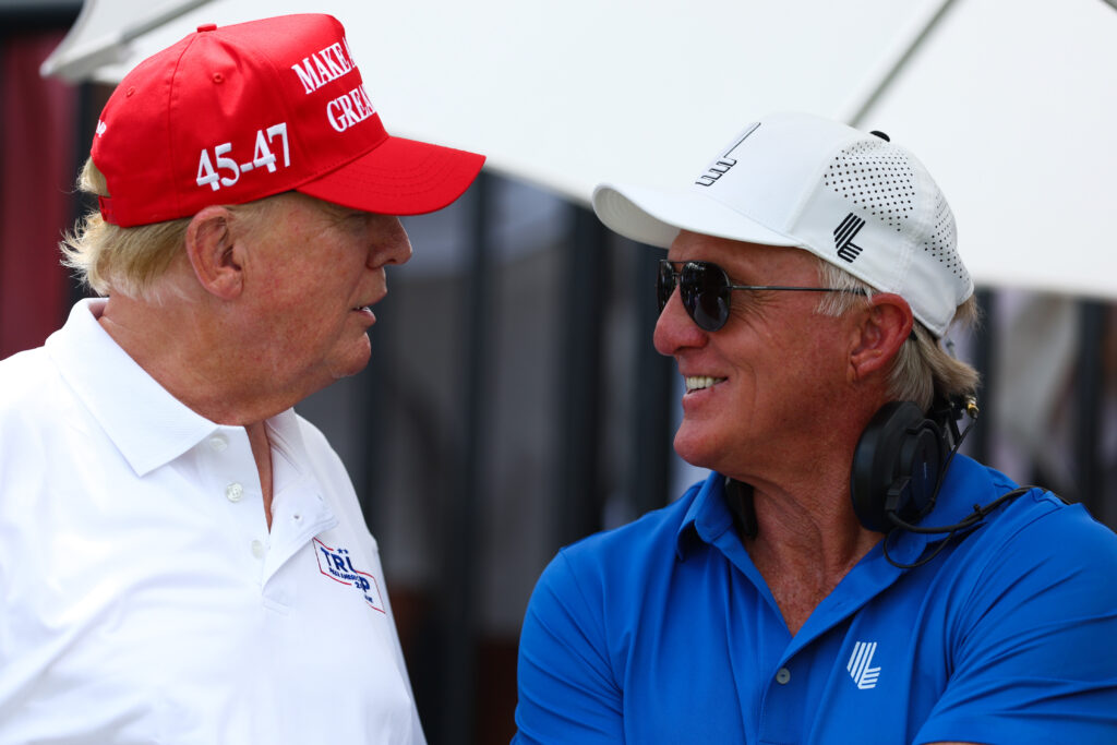 Greg Norman talks with Donald Trump during the LIV Golf event in Miami