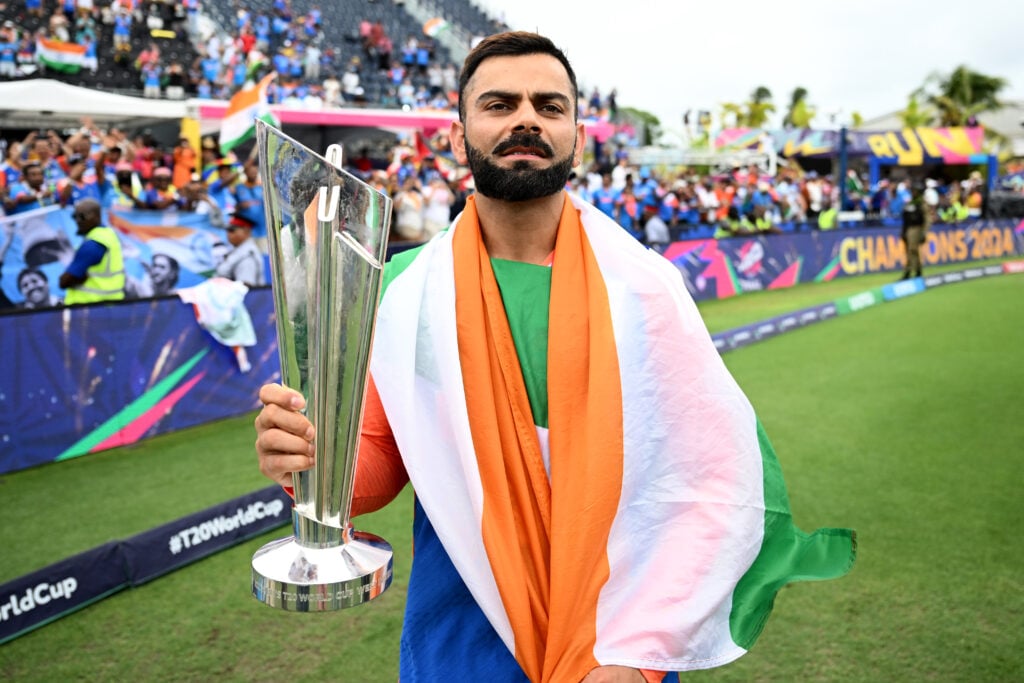 Virat Kohli of India celebrates with the ICC Men's T20 Cricket World Cup following the ICC Men's T20 Cricket World Cup West Indies & USA 2024 Final match between South Africa and India at Kensington Oval on June 29, 2024 in Bridgetown, Barbados.