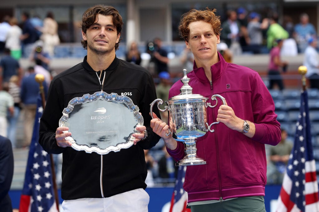 Taylor Fritz and Jannik Sinner pose with their trophies after the 2024 US Open final