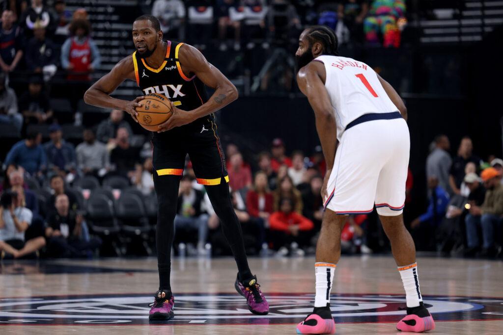 Kevin Durant #35 of the Phoenix Suns looks to pass in front of James Harden #1 of the LA Clippers during a 125-119 Suns win at Intuit Dome on October 31, 2024 in Inglewood, California.