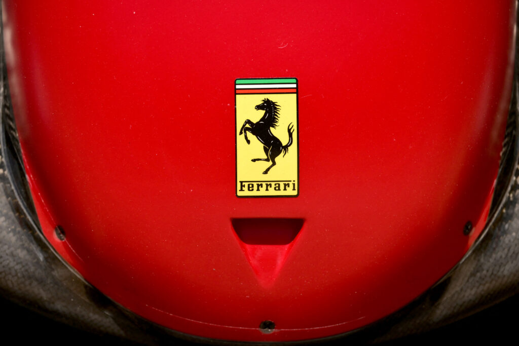 Ferrari logo on a car ahead of the first practice session for the 2025 Emilia Romagna Formula One Grand Prix at the Imola autodrome.
