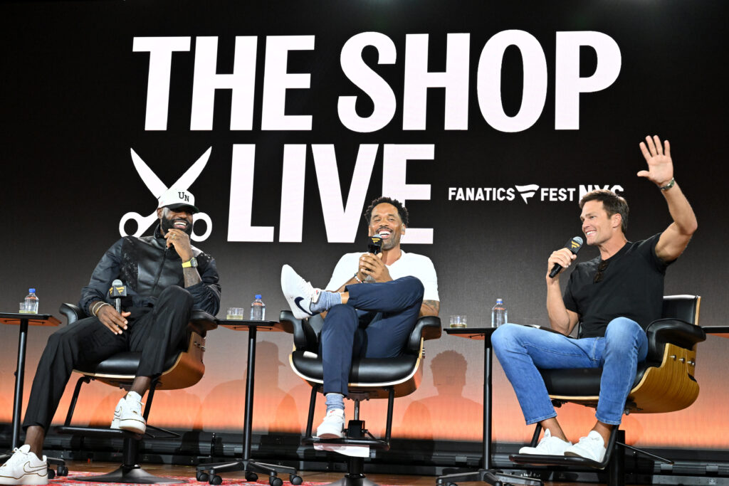 LeBron James, Maverick Carter and Tom Brady speak onstage during Fanatics Fest NYC 2025