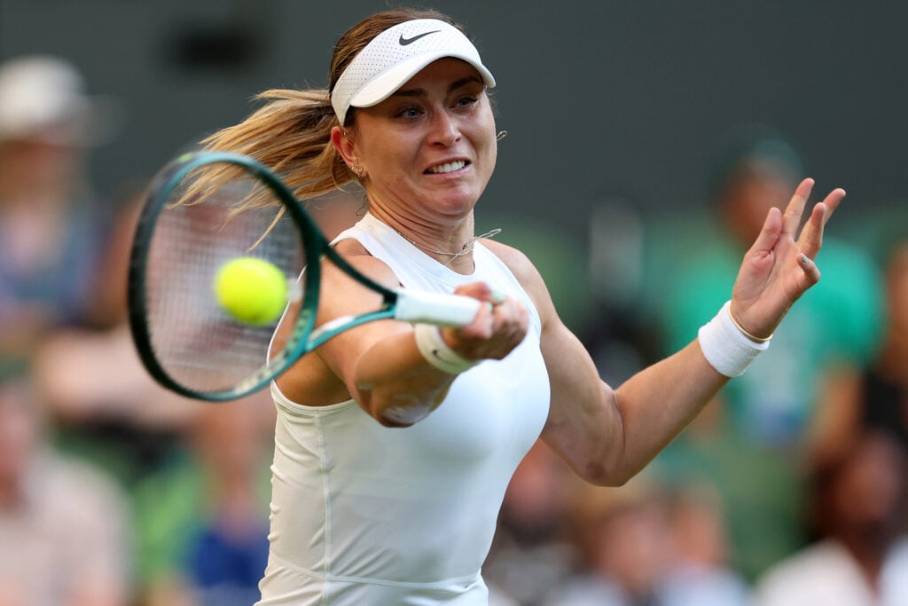 Paula Badosa of Spain plays a forehand against Katie Boulter of Great Britain during the Ladies' Singles first round match on day one of The Championships Wimbledon 2025 at All England Lawn Tennis and Croquet Club on June 30, 2025 in London, England.