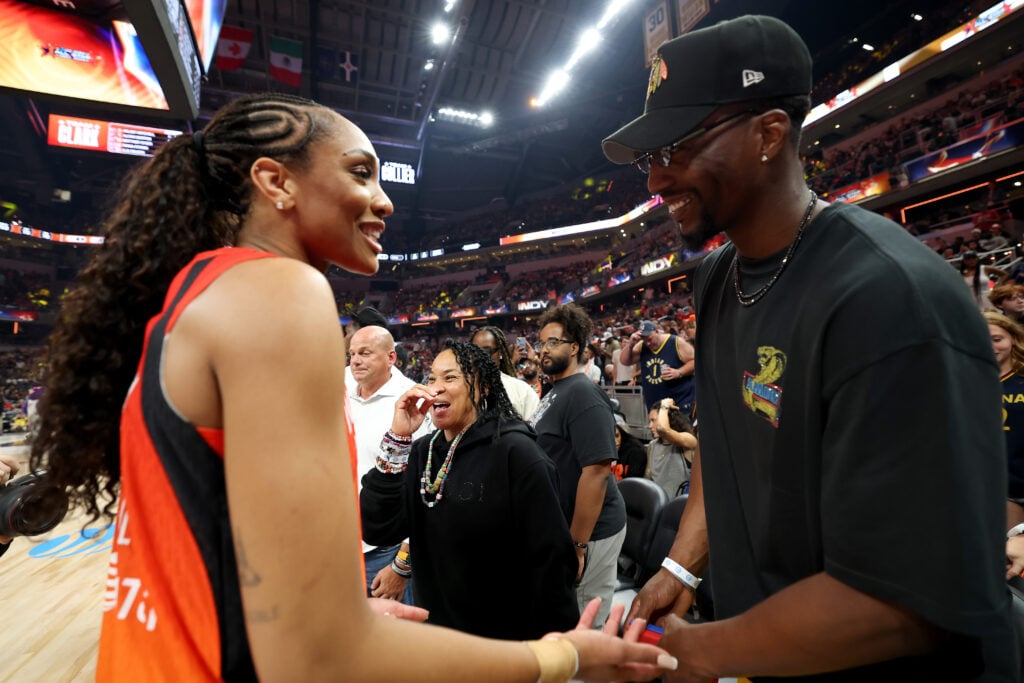 A’ja Wilson #22 of the Las Vegas Aces talks with boyfriend Bam Adebayo of the Miami Heat during the 2025 AT&T WNBA All-Star Game at Gainbridge Fieldhouse.