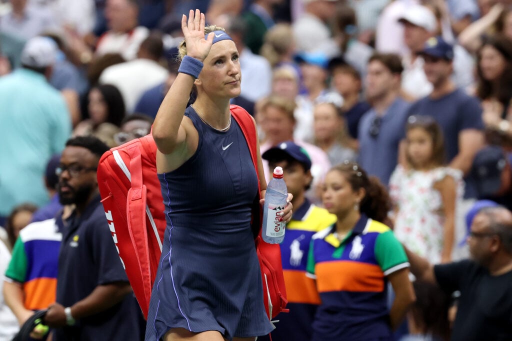 Victoria Azarenka waves to the crowd after being beaten by Jessica Pegula at the 2025 US Open.