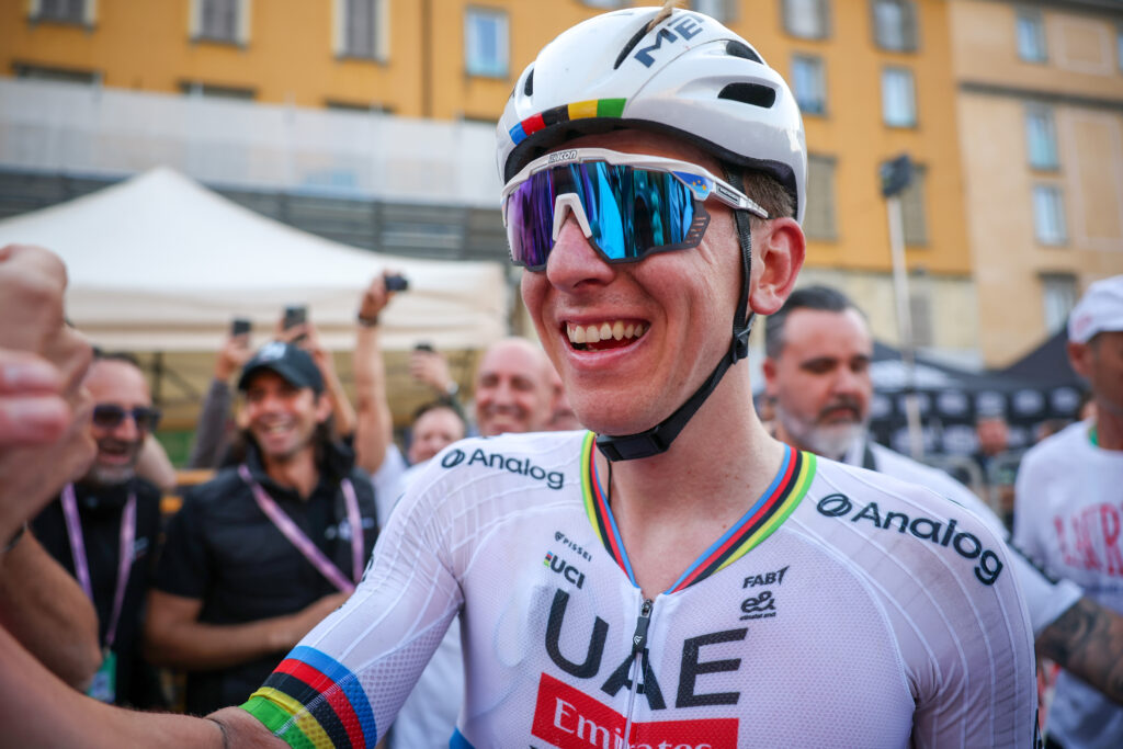 Tadej Pogacar celebrates after winning the 119th Il Lombardia