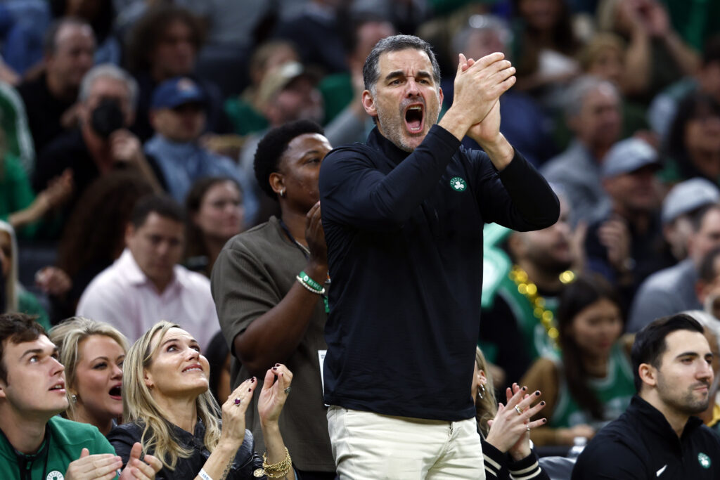 Boston Celtics owner Bill Chisholm cheers in the third quarter at TD Garden.