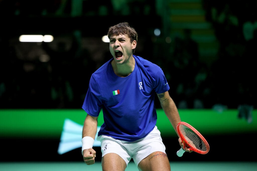 Flavio Cobolli of Italy celebrates match point against Zizou Bergs of Belgium during the Davis Cup Semi-Final match between Italy and Belgium at BolognaFiere Exhibition Centre on November 21, 2025 in Bologna, Italy.