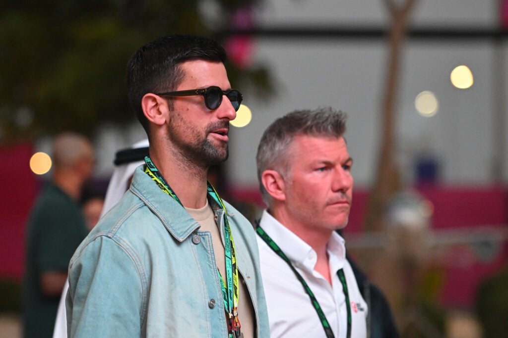 Novak Djokovic looks on prior to the F1 Grand Prix of Qatar at Lusail International Circuit on November 30, 2025 in Lusail City, Qatar.