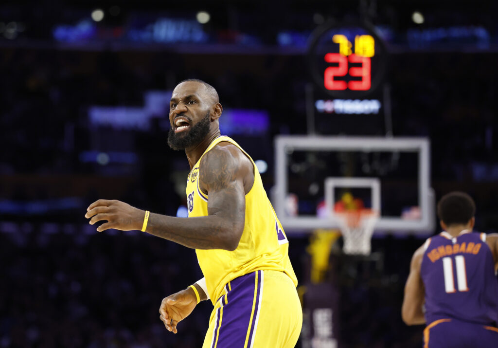 LeBron James #23 of the Los Angeles Lakers controls the ball against the Phoenix Suns in the second half at Crypto.com Arena.