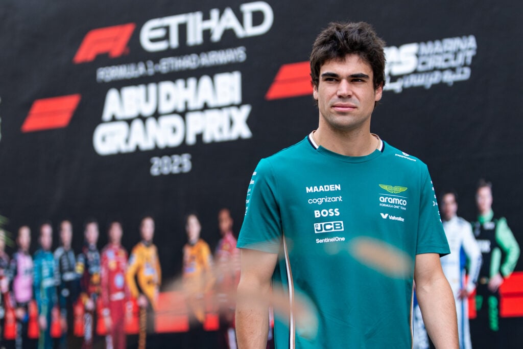 Lance Stroll of Aston Martin walks in the paddock at the 2025 Abu Dhabi Grand Prix