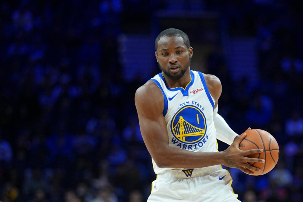 Jonathan Kuminga #1 of the Golden State Warriors dribbles the ball against the Philadelphia 76ers at Xfinity Mobile Arena.